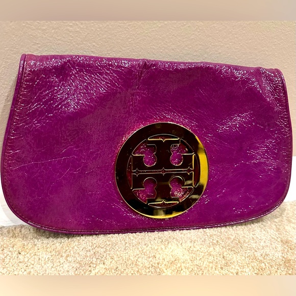 Tory Burch Handbags - Super fun, purple and gold Tory Burch clutch in very good condition!